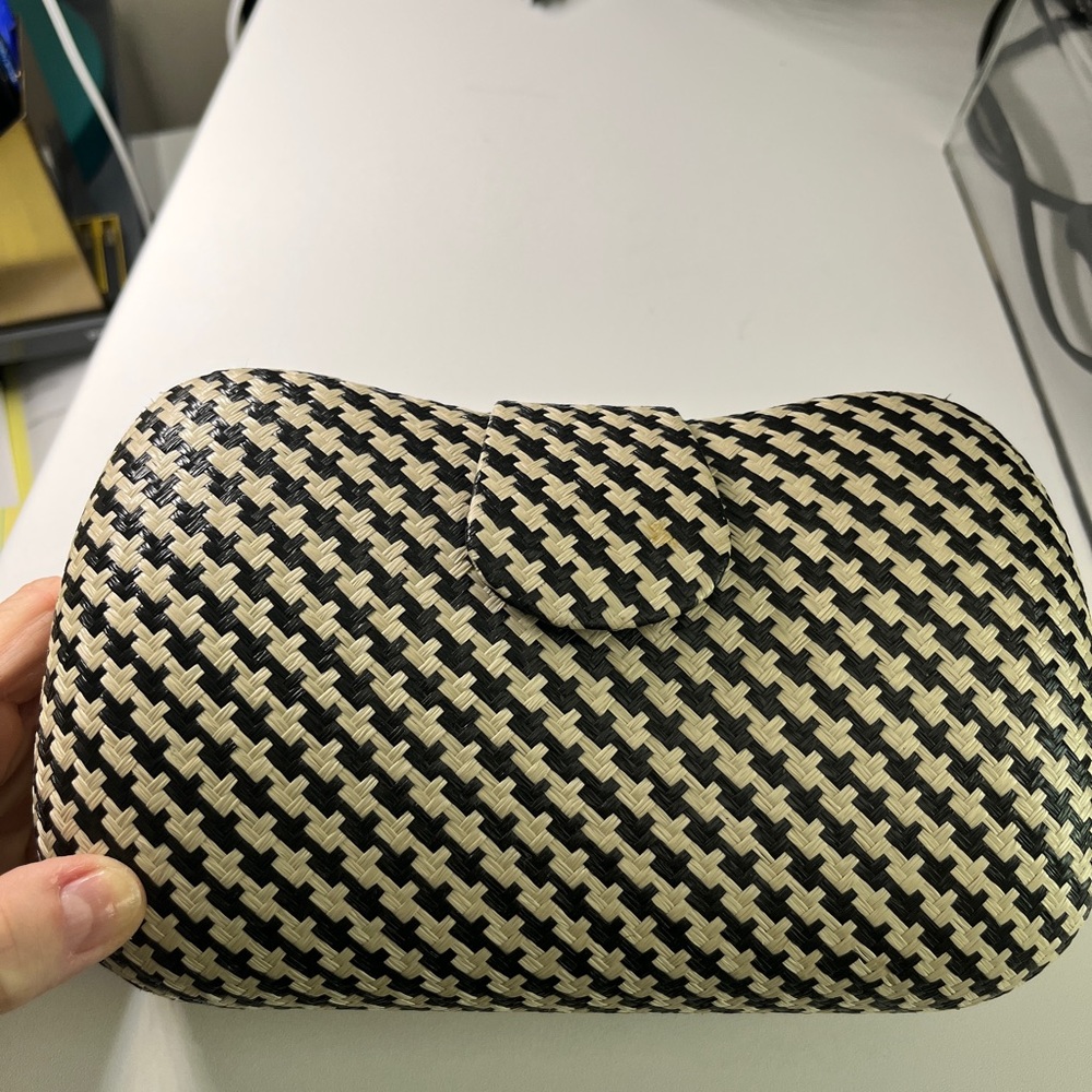 Clutch. Black and cream. Magnetic opening. EUC. 8x2x7.5 inches.